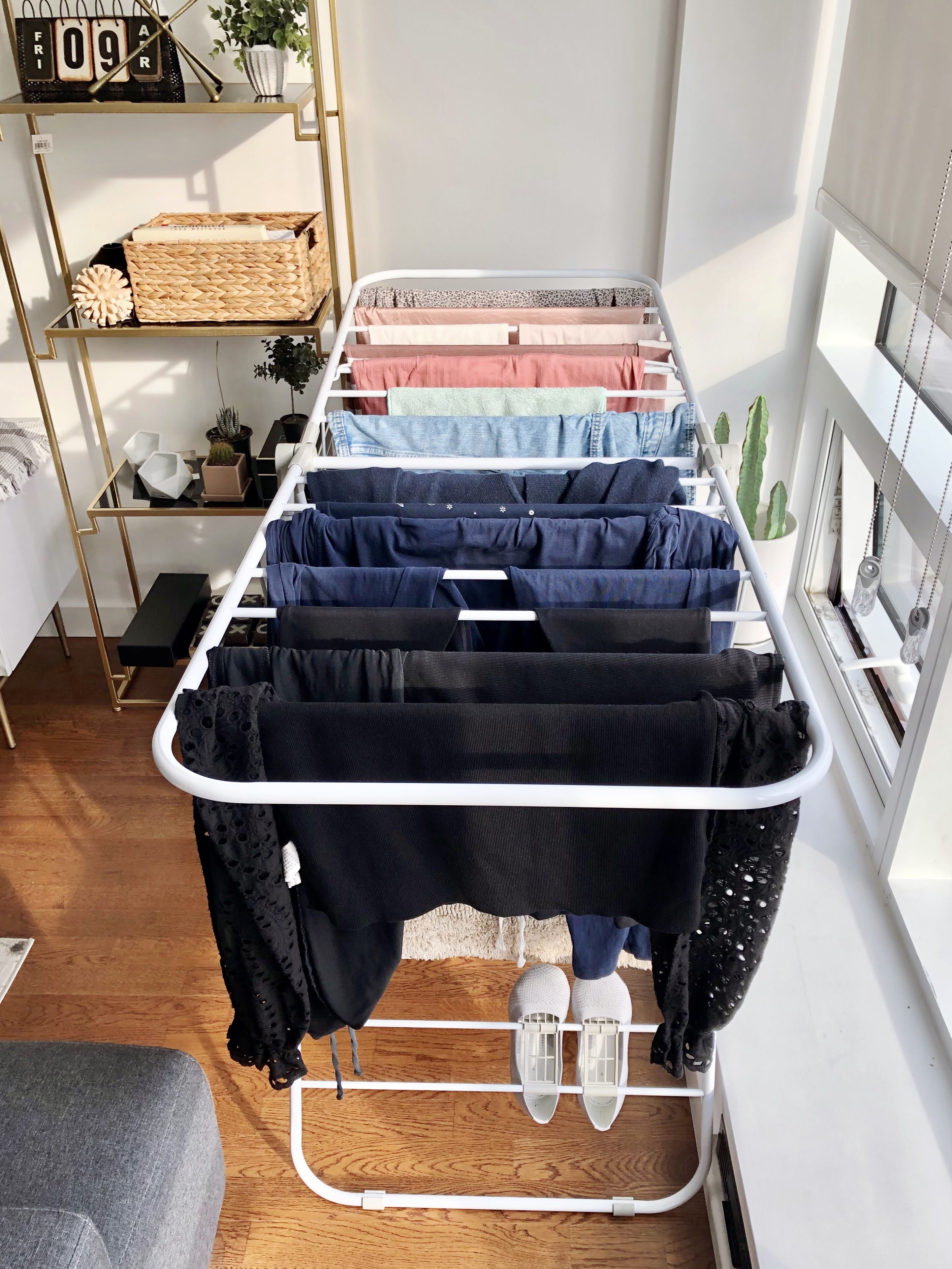 the-best-way-to-dry-your-clothes-indoors-with-a-drying-rack-styled-by